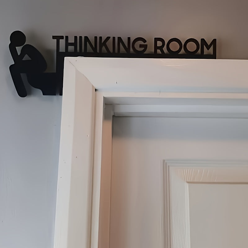 "Add a Touch of Fun: Charming Black Wooden Bathroom Door Frame Decor"