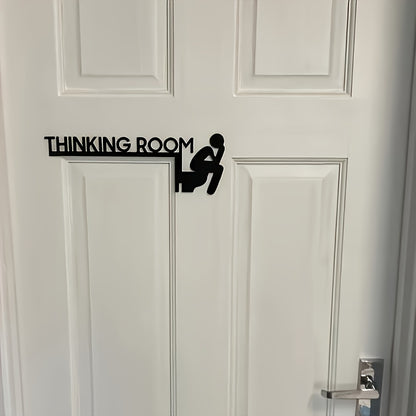 "Add a Touch of Fun: Charming Black Wooden Bathroom Door Frame Decor"